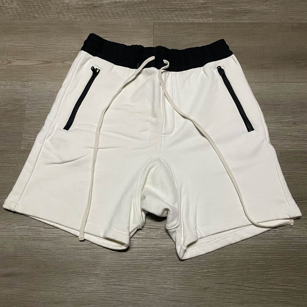 Fear Of God Essentials white with black waistband and zipper pockets size S